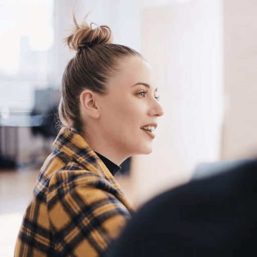 Person with plaid shirt